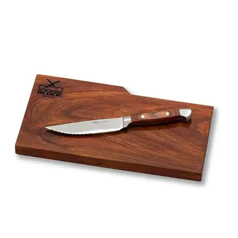 Wooden cutting board with a knife on a white background