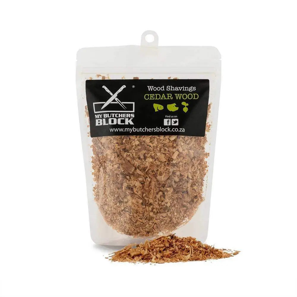 Bag of cedar wood shavings with visible brand label on a white background