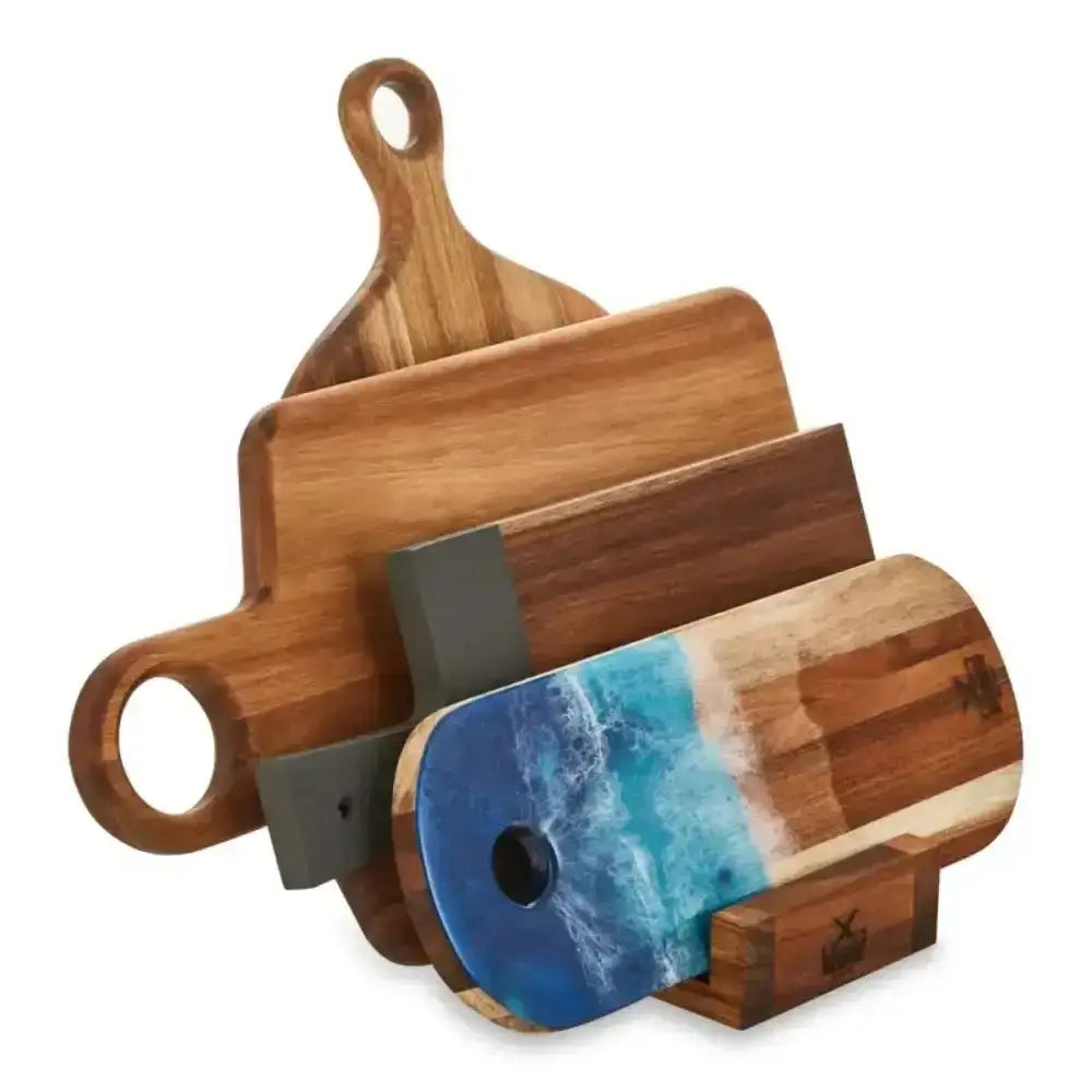 Set of wooden cutting boards with a blue resin design on a white background