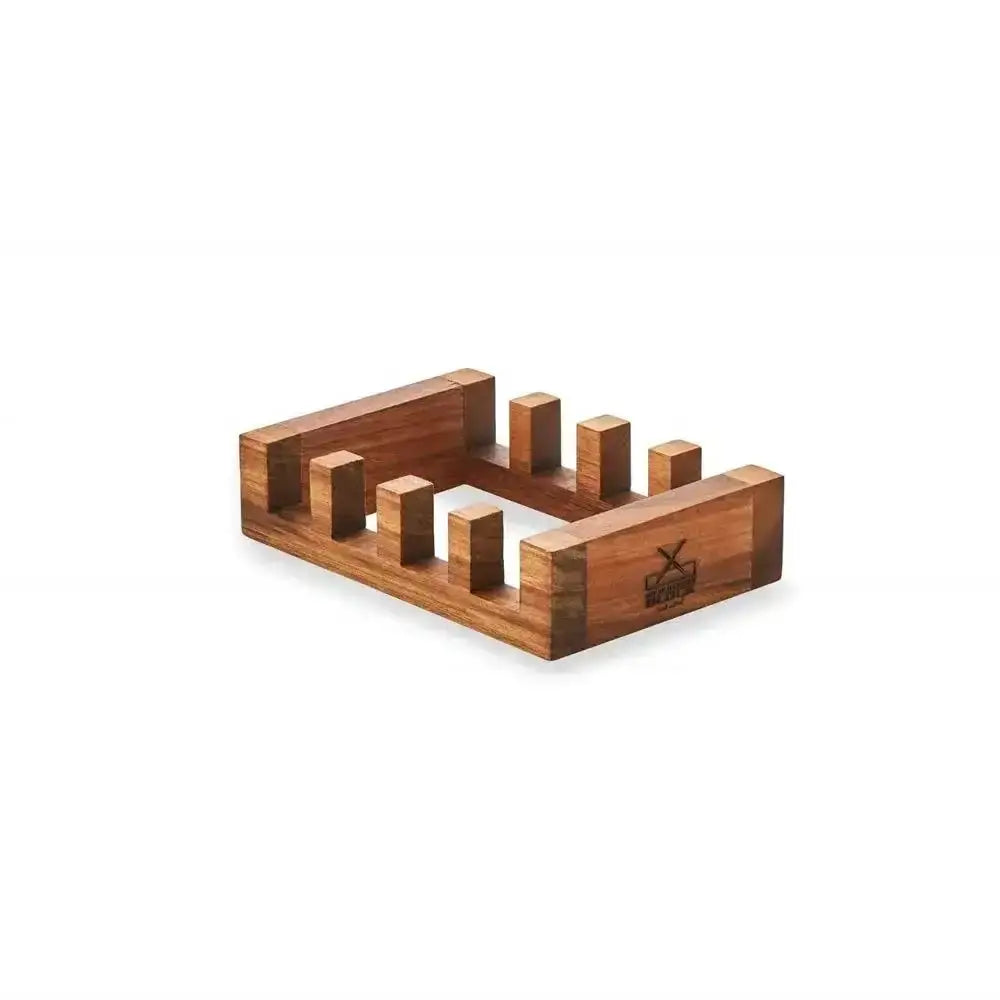 Wooden knife block with multiple slots on a white background