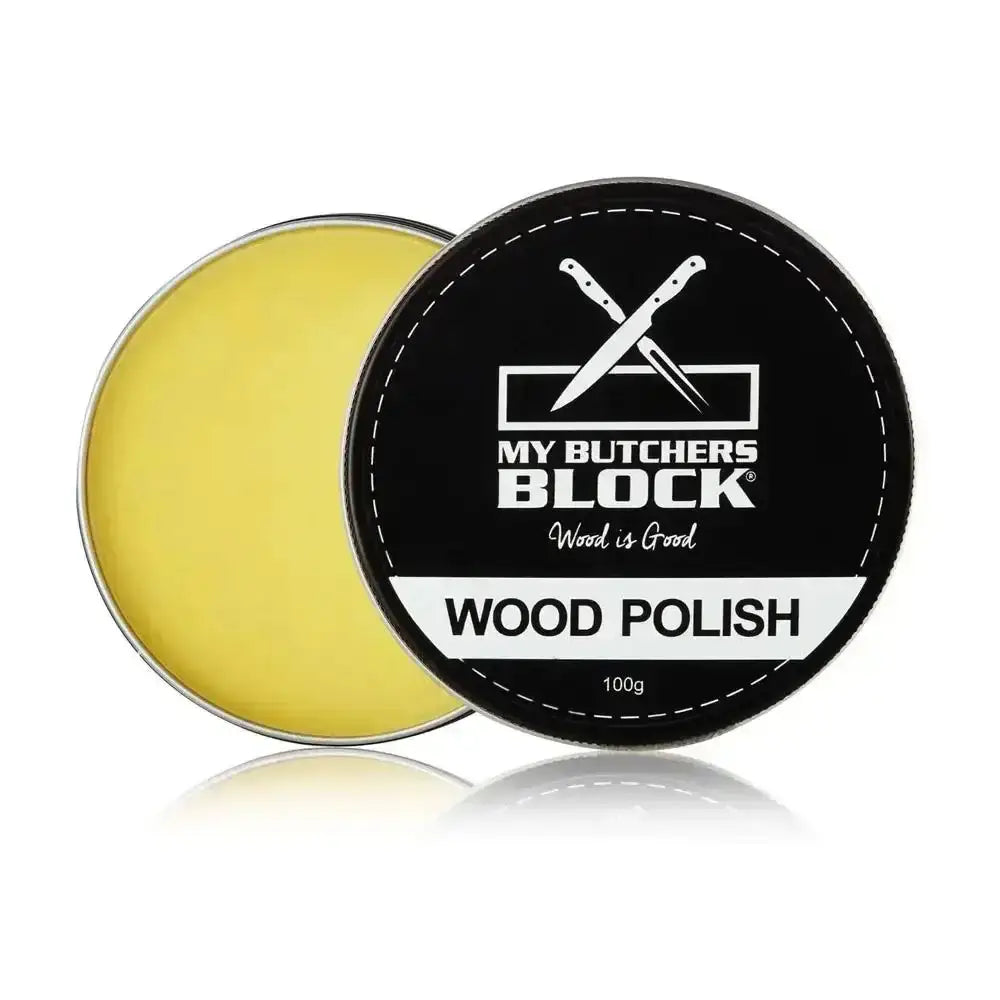 Wood polish container with black lid and yellow interior on a white background