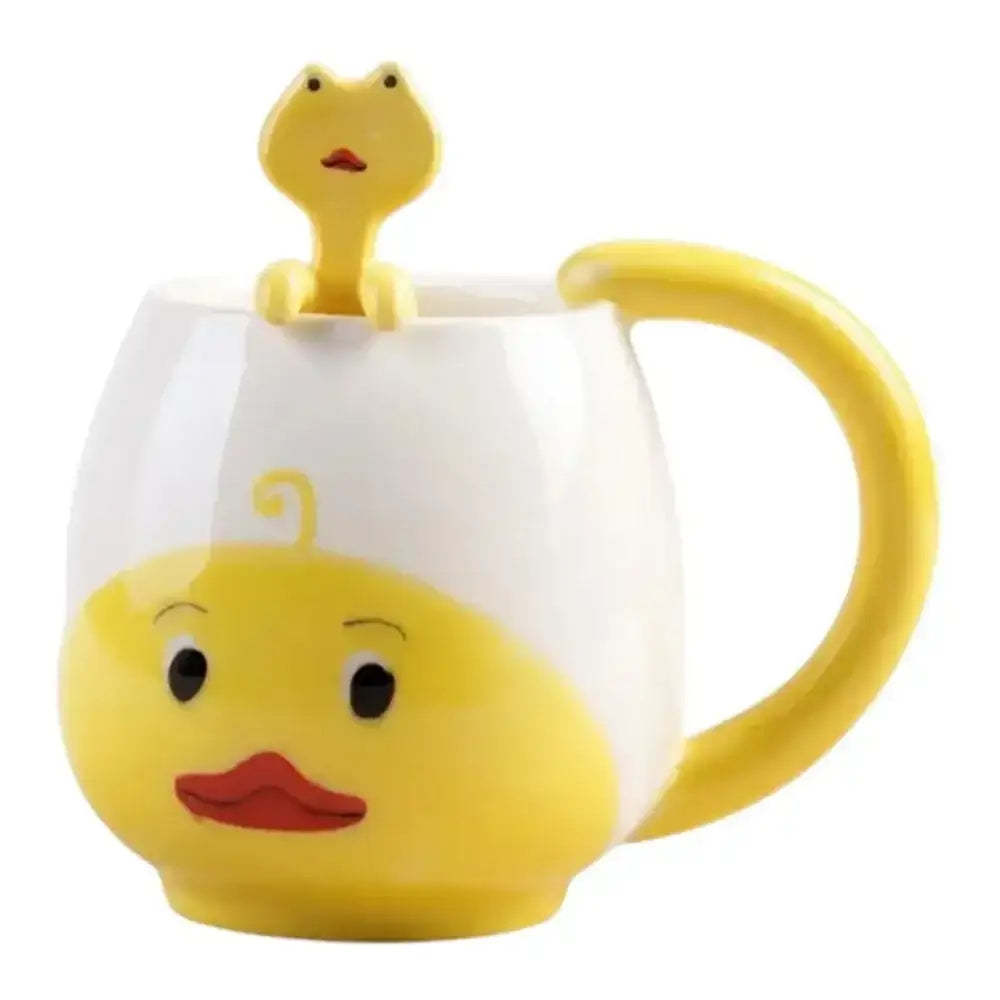 Yellow duck-shaped mug with a matching spoon on a white background