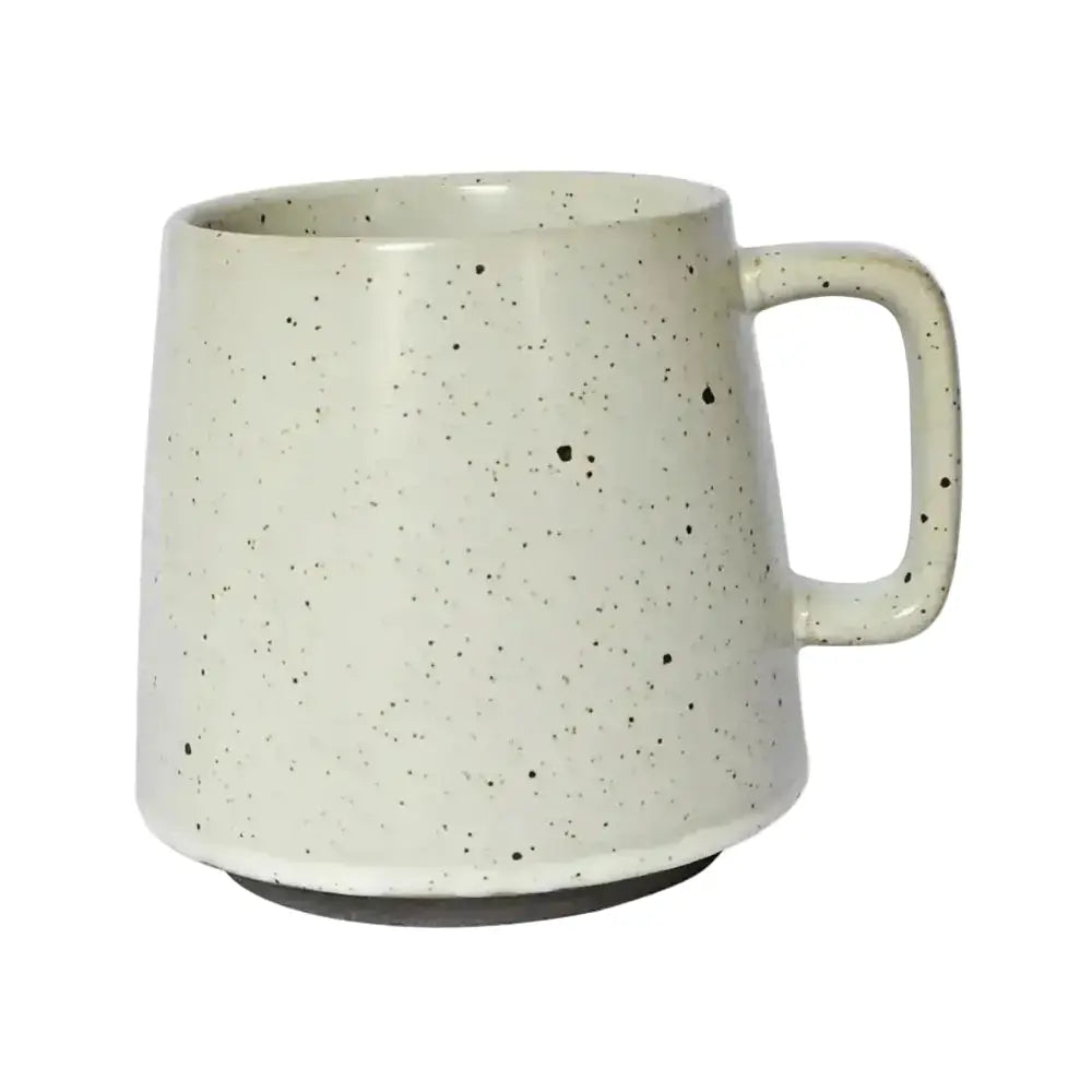 Speckled ceramic mug on a white background