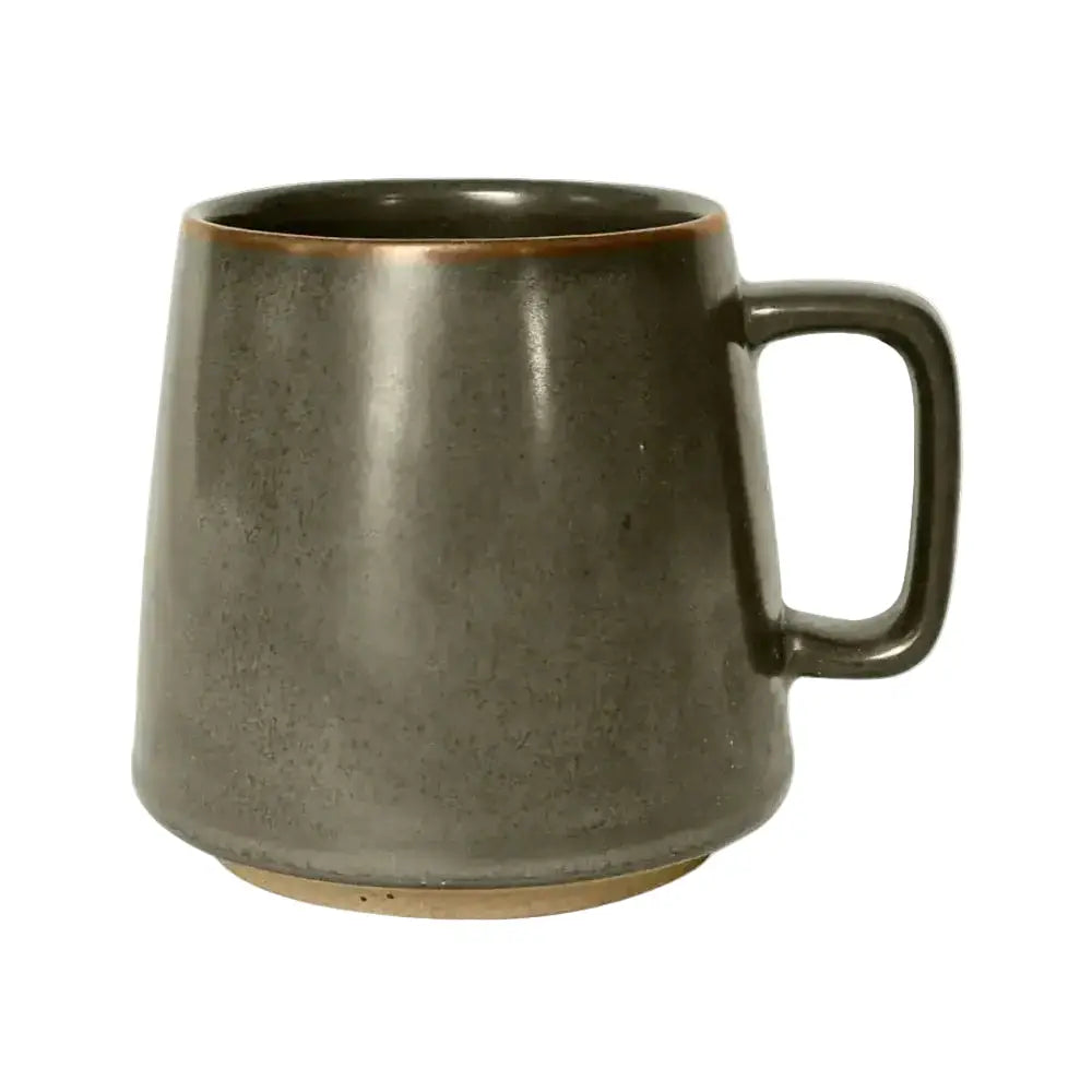 Dark brown ceramic mug on a white background