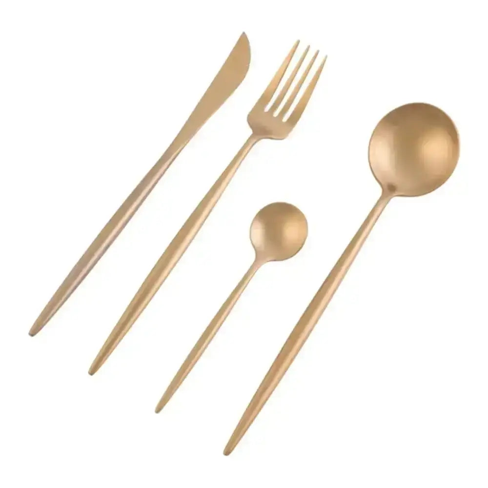 Set of gold cutlery including knife, fork, and two spoons on a white background