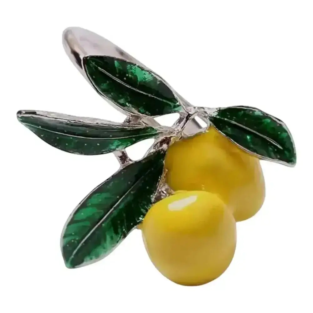 Napkin ring with two yellow lemons and green leaves on a white background