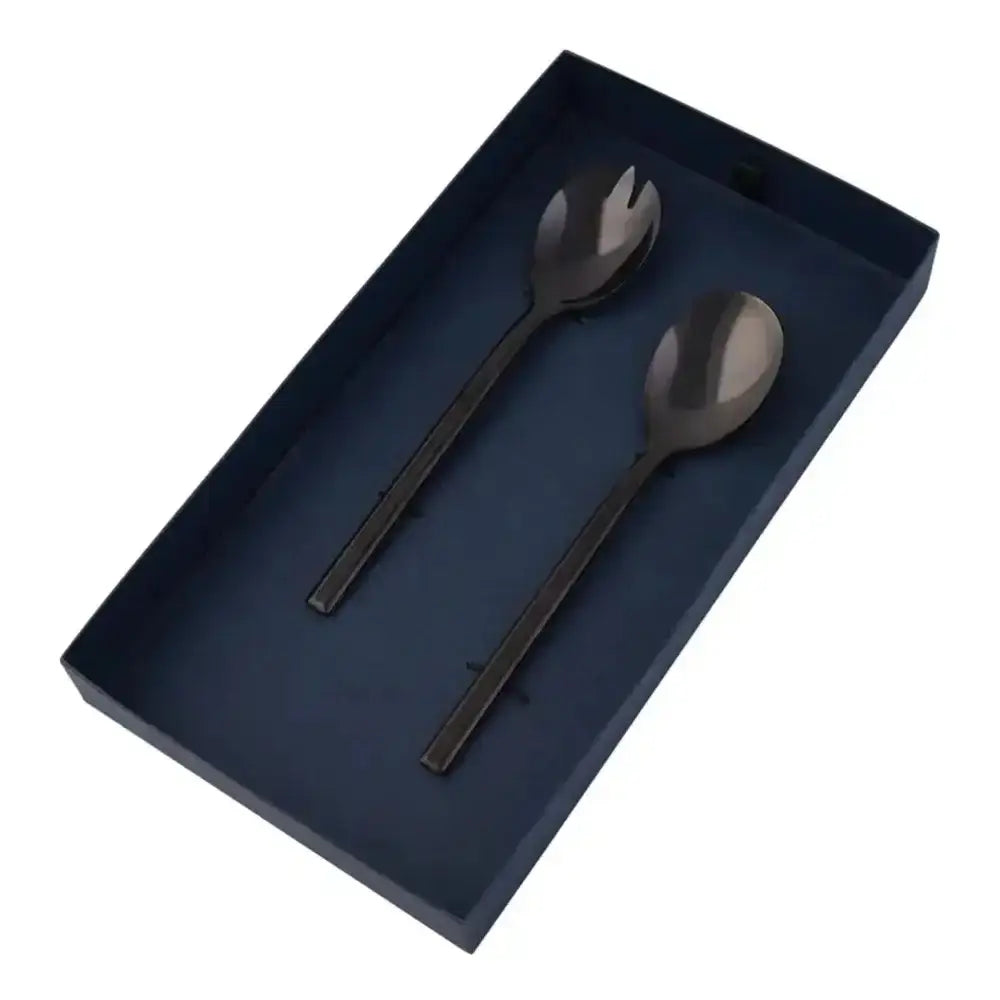 Two black spoons in a dark blue box on a white background