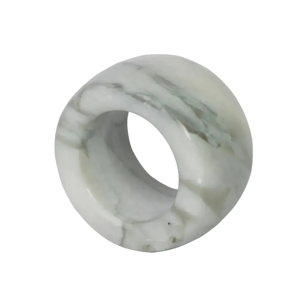 Marble-patterned ring on a white background