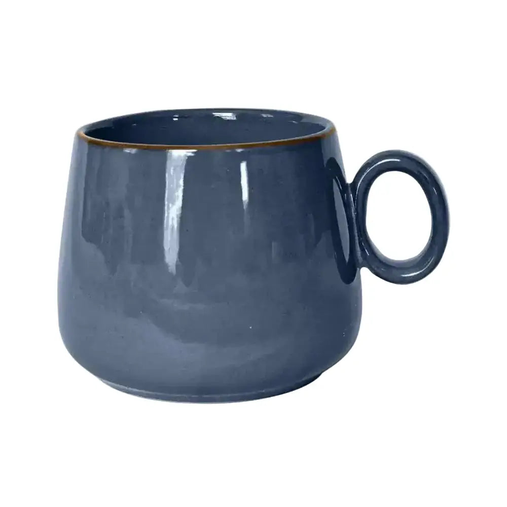Blue ceramic mug on a white background