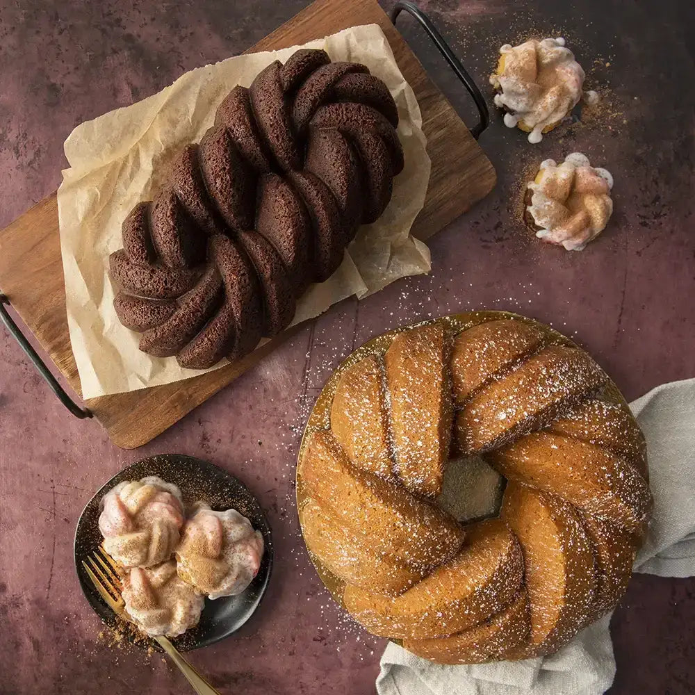 Braided Bundt cakes on a rustic table, ideal for premium kitchenware at Cookin Stores