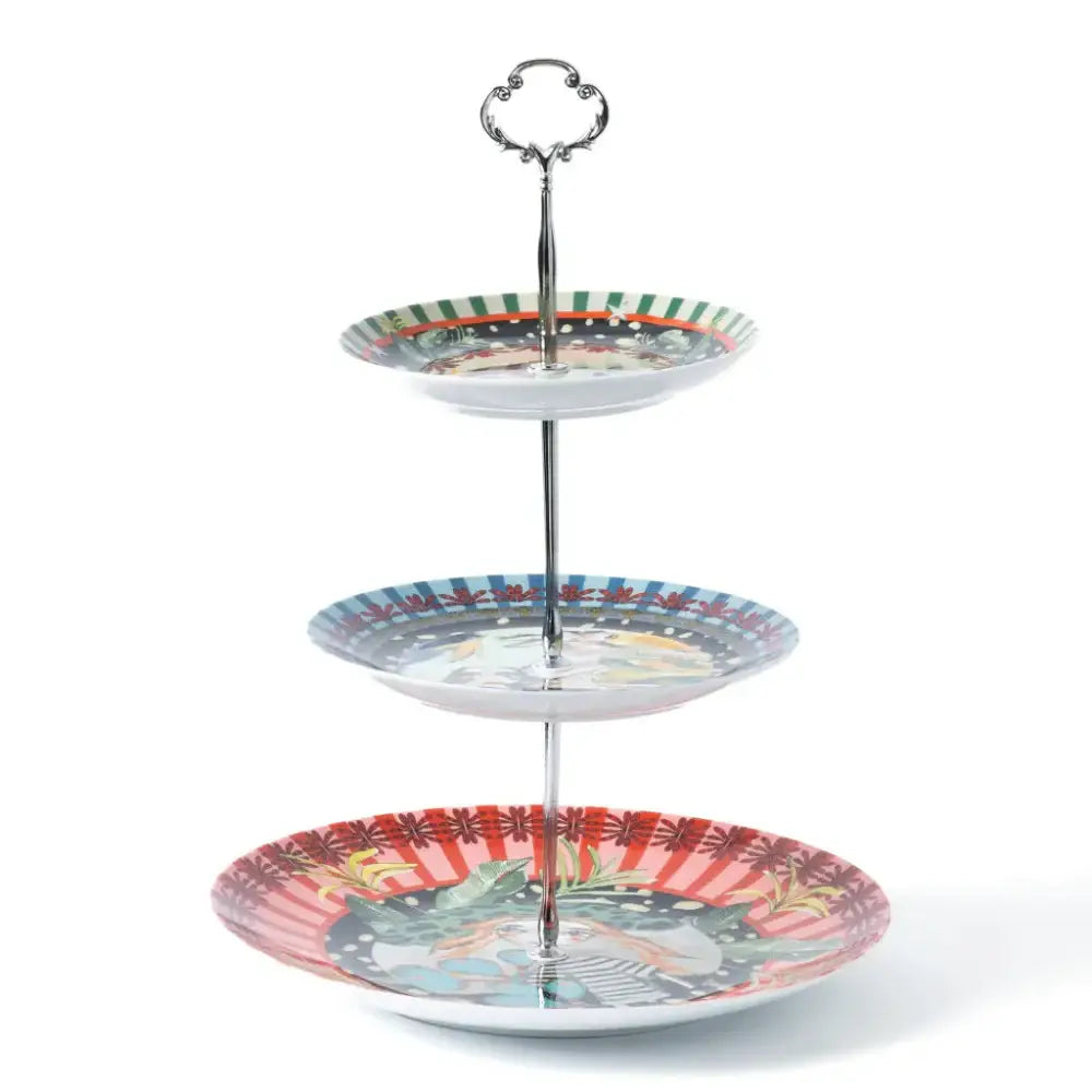 Three-tiered serving tray with colorful designs on a white background