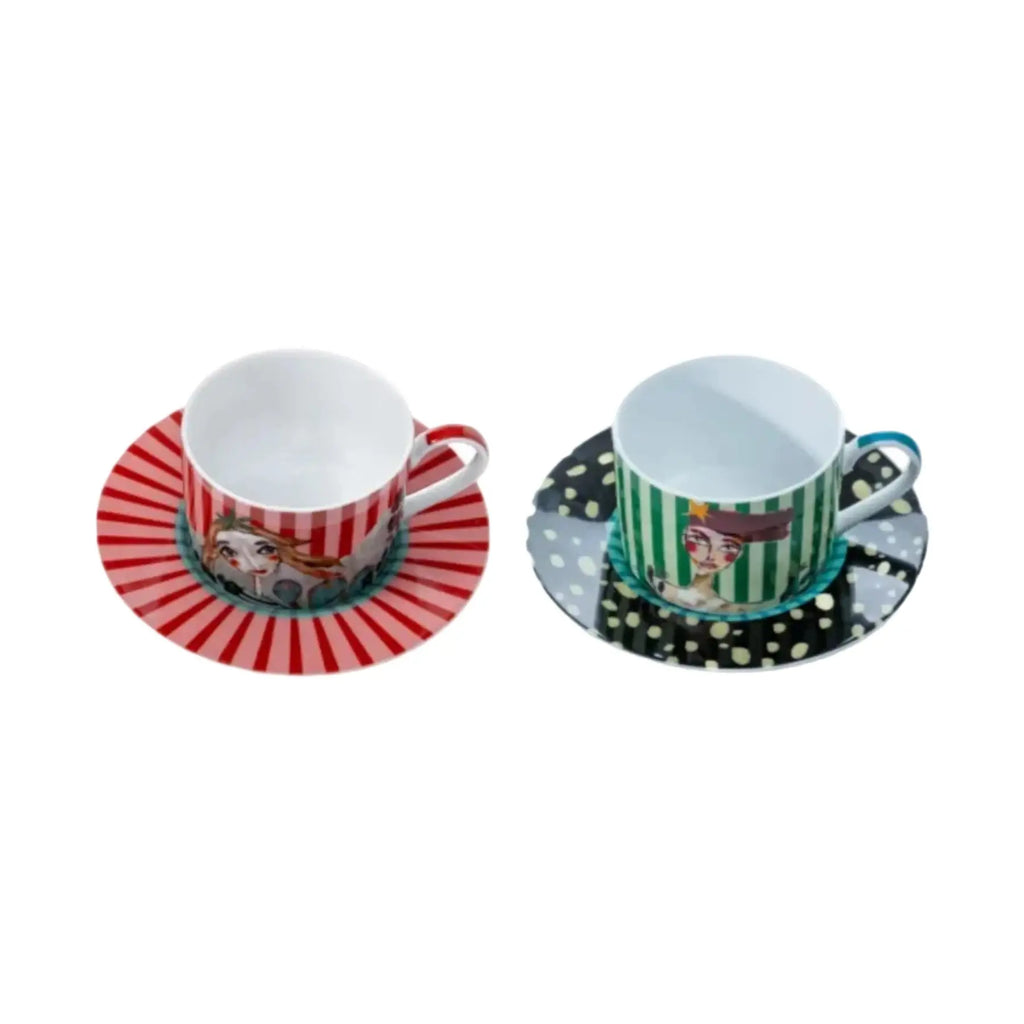 Two ceramic cups with saucers on a white background
