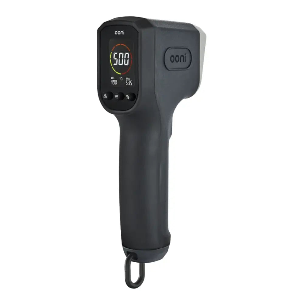 Black infrared thermometer with digital display on a white background