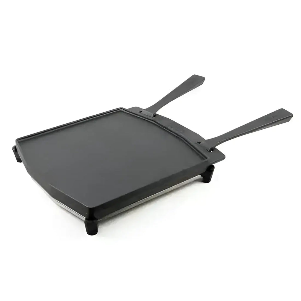 Black rectangular cast iron grizzler plate with two handles and four feet for use with pizza ovens and stainless steel trivet