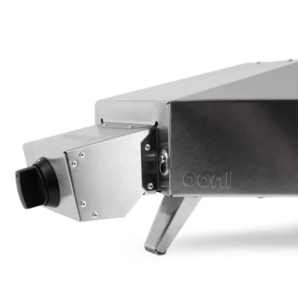 Metallic device with 'Ooni' branding on a white background