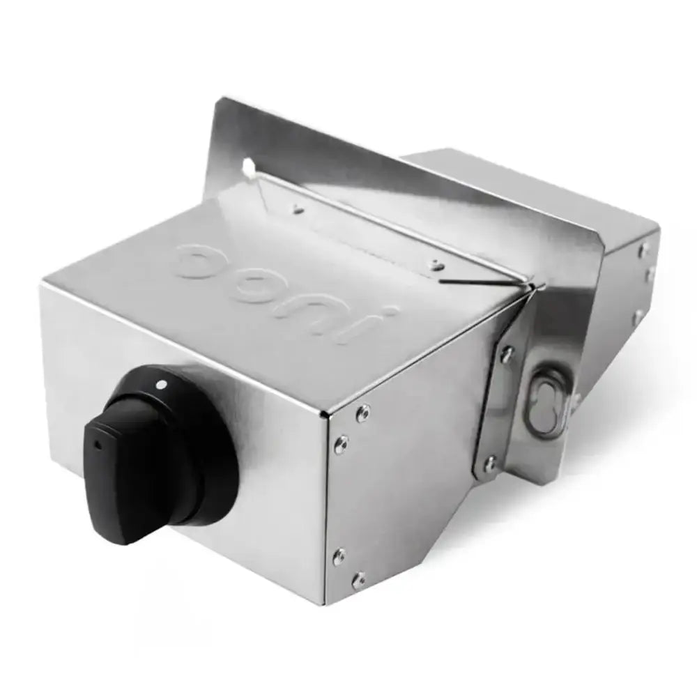 Metallic box with a black knob on a white background