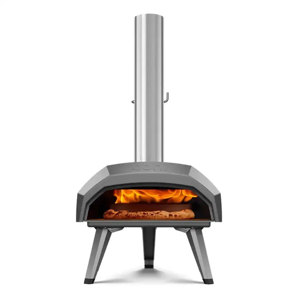 Outdoor pizza oven with fire inside on a white background