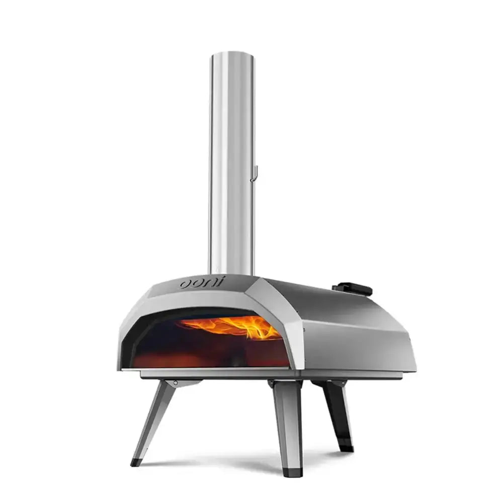 Portable outdoor pizza oven with visible flame on a white background