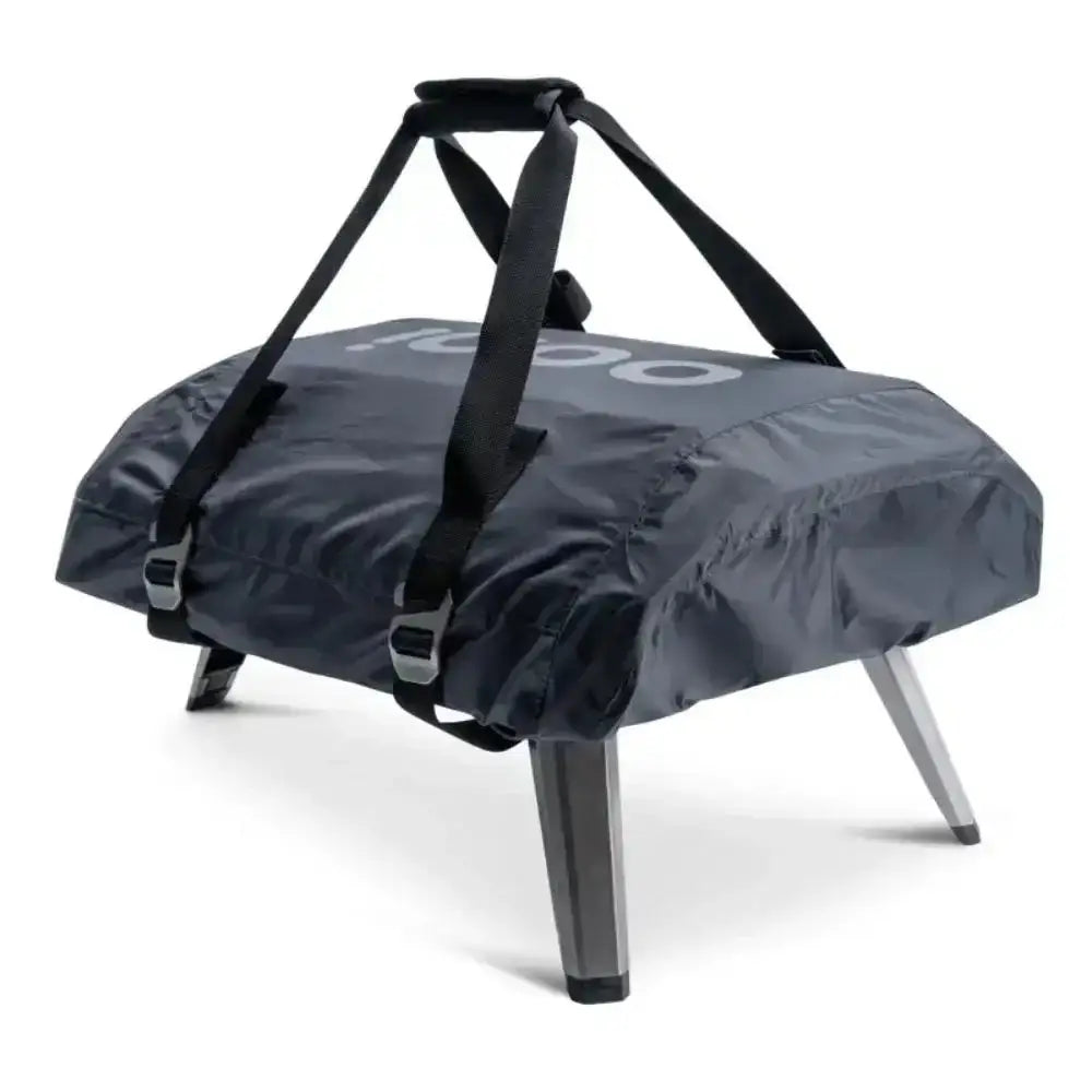 Outdoor pizza oven in a carry bag on a white background