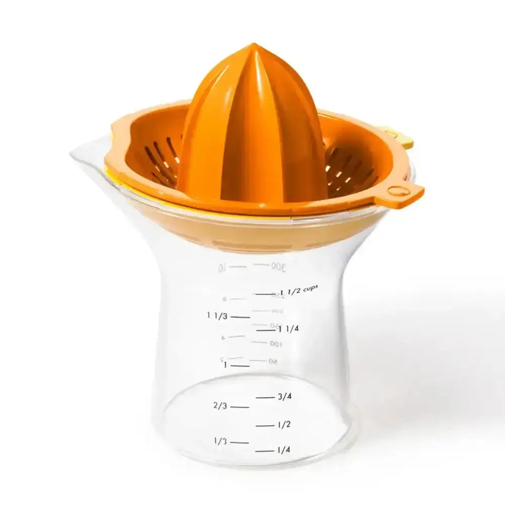 Orange manual juicer with clear container on a white background