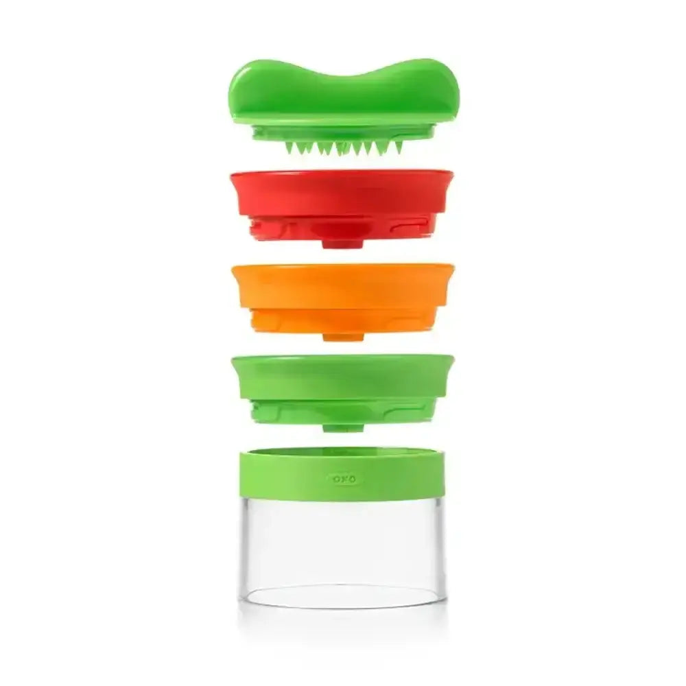 Stackable containers with green, red, and orange lids on a white background
