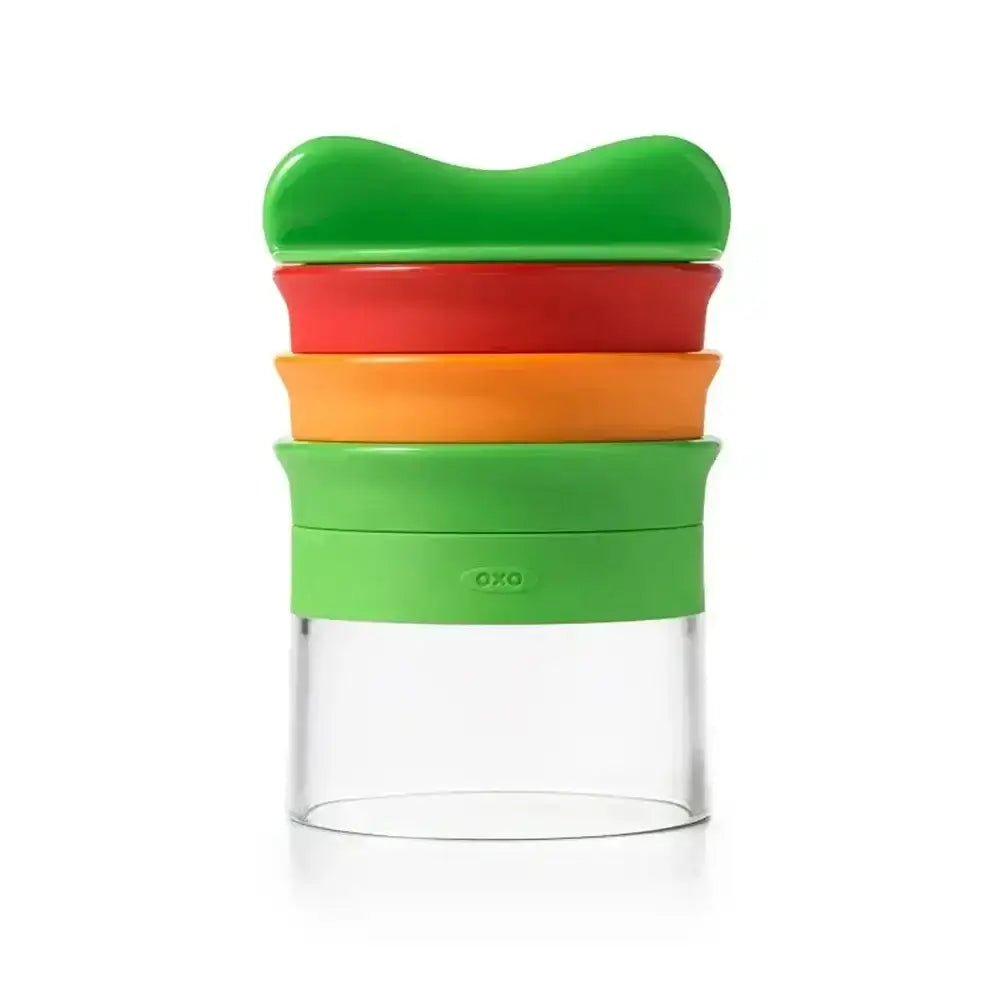 Colourful hand held spiralizer on a white background