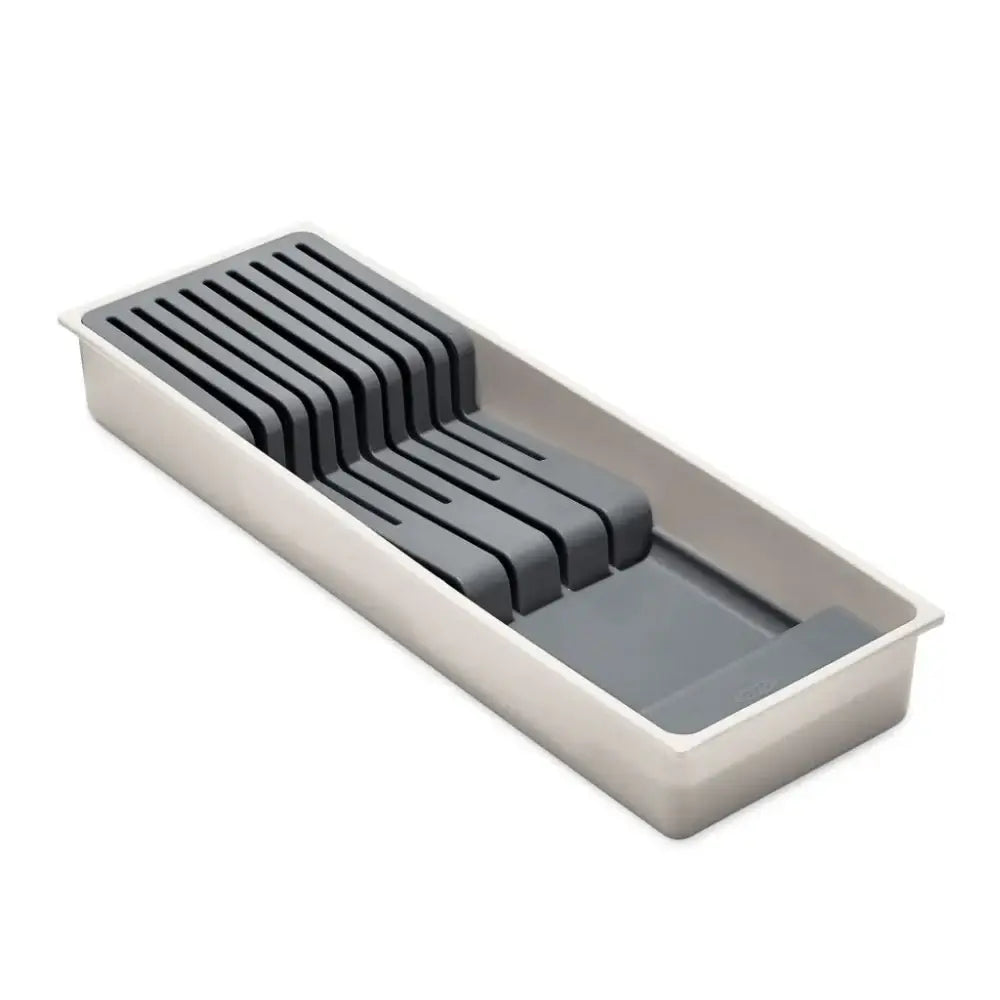 Oxo good grips compact knife drawer organizer with gray silicone slots and a sleek rectangular metal frame