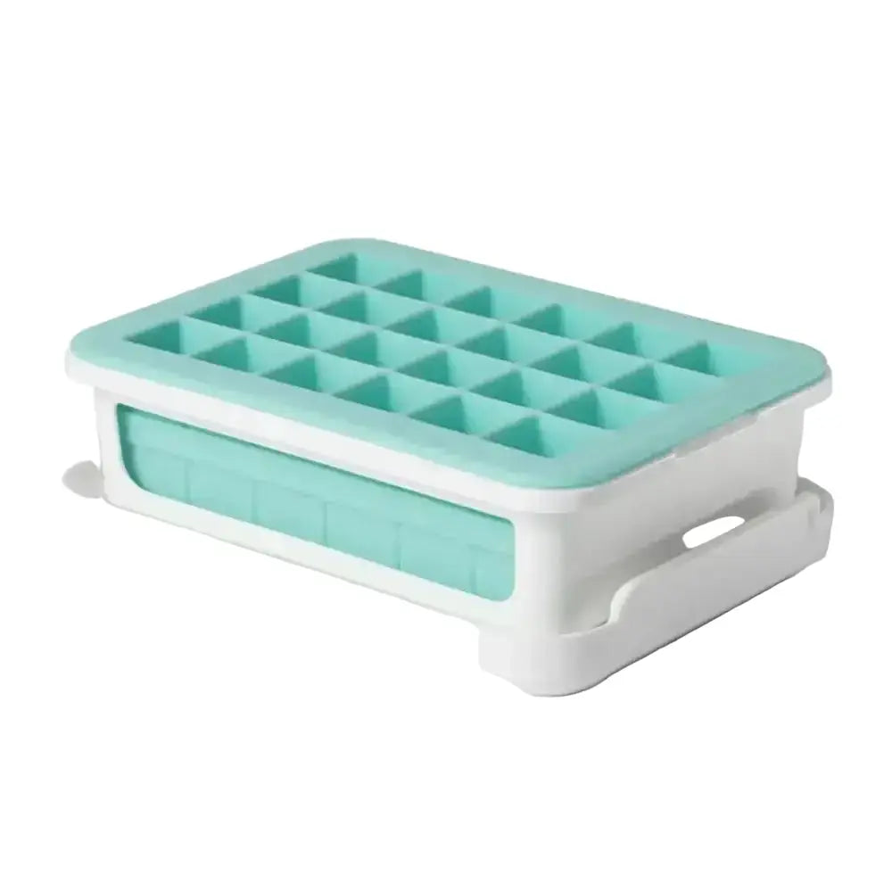 Turquoise ice cube tray with white base on a white background