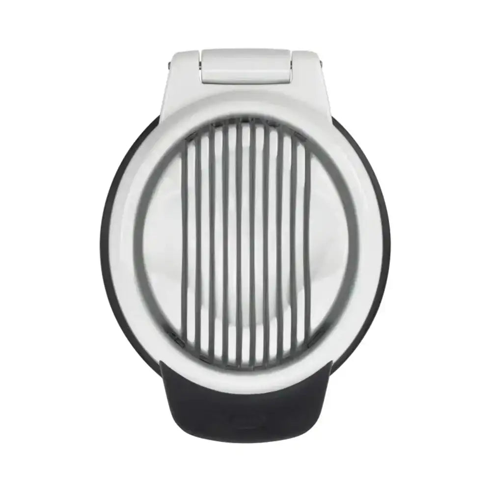Round kitchen tool with a black base and silver top on a white background