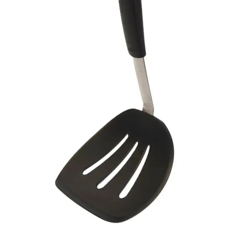 Black slotted spatula with a black handle on a white background