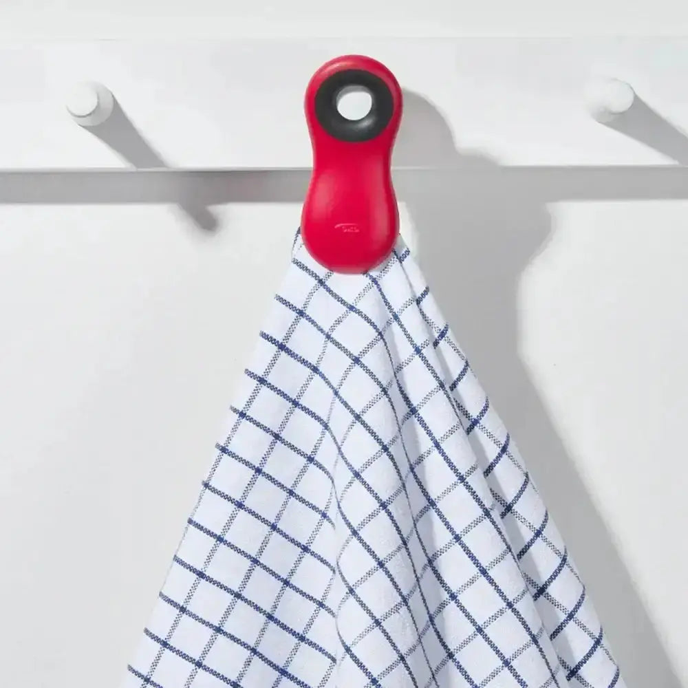 Red hook with a white towel on a white background