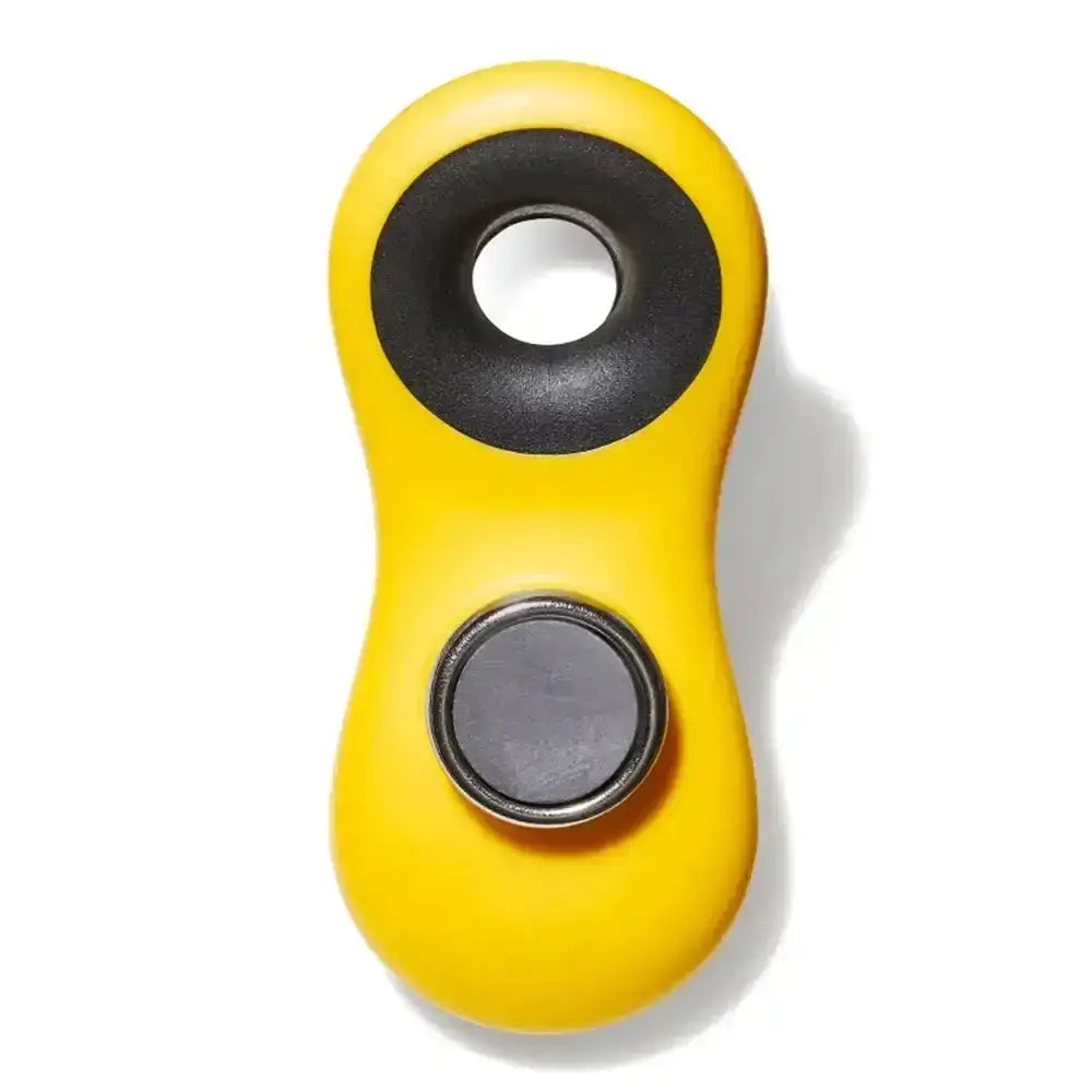 Yellow and black kitchen tool with a circular design on a white background