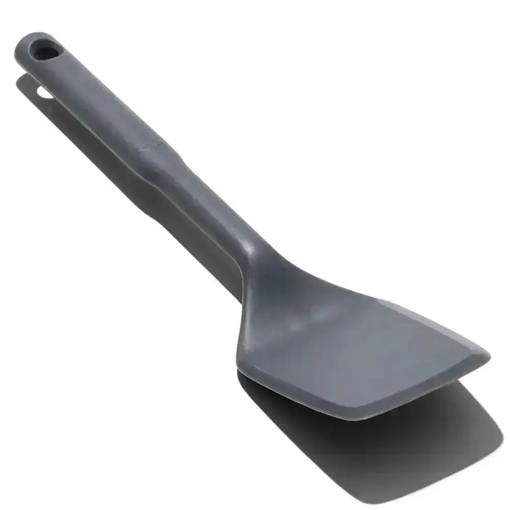 Gray silicone turner on a white background