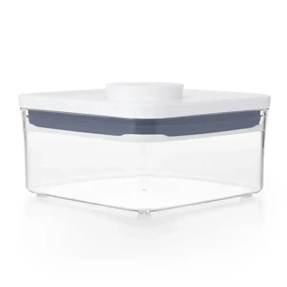 Clear storage container with a white lid on a white background