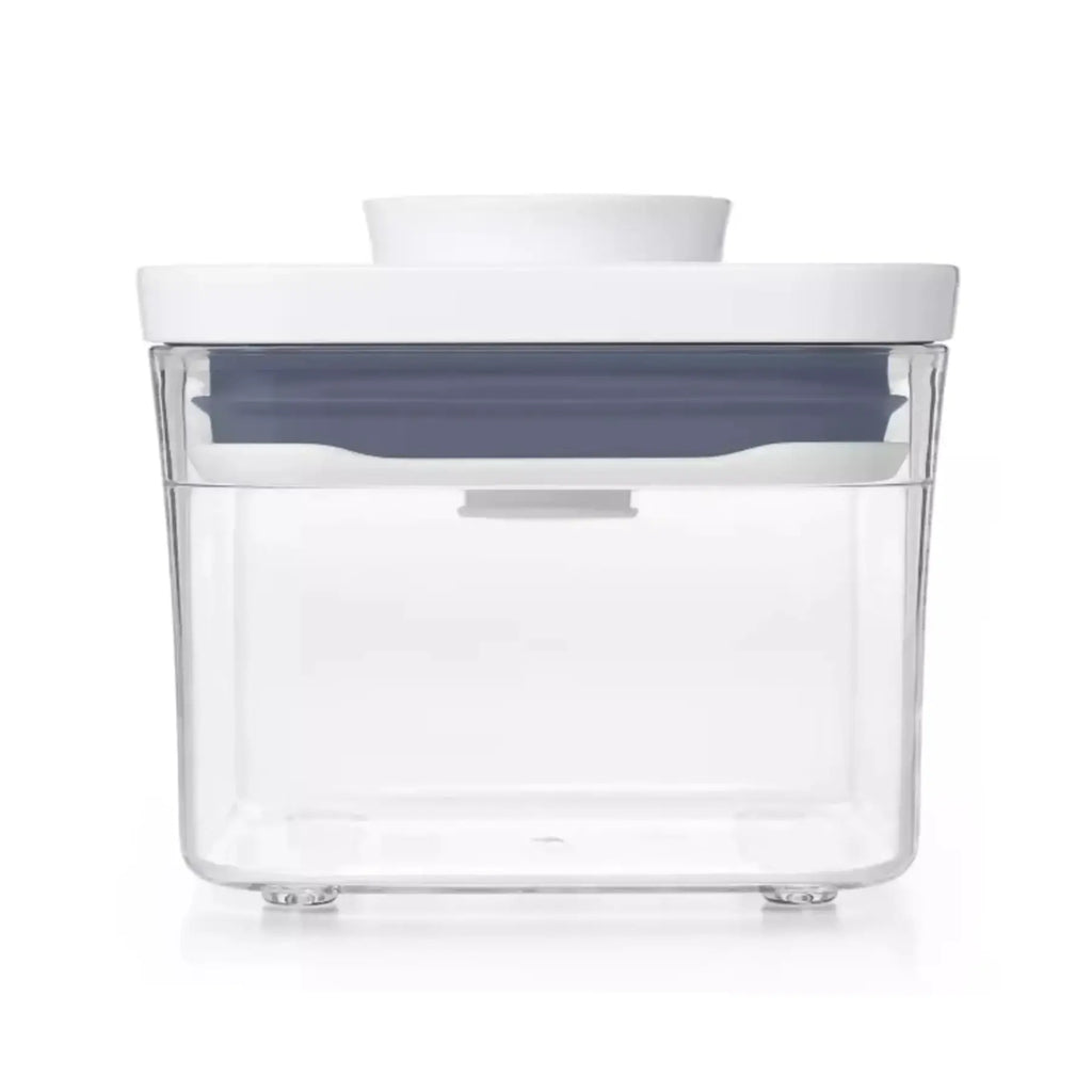 Clear storage container with a white lid on a white background