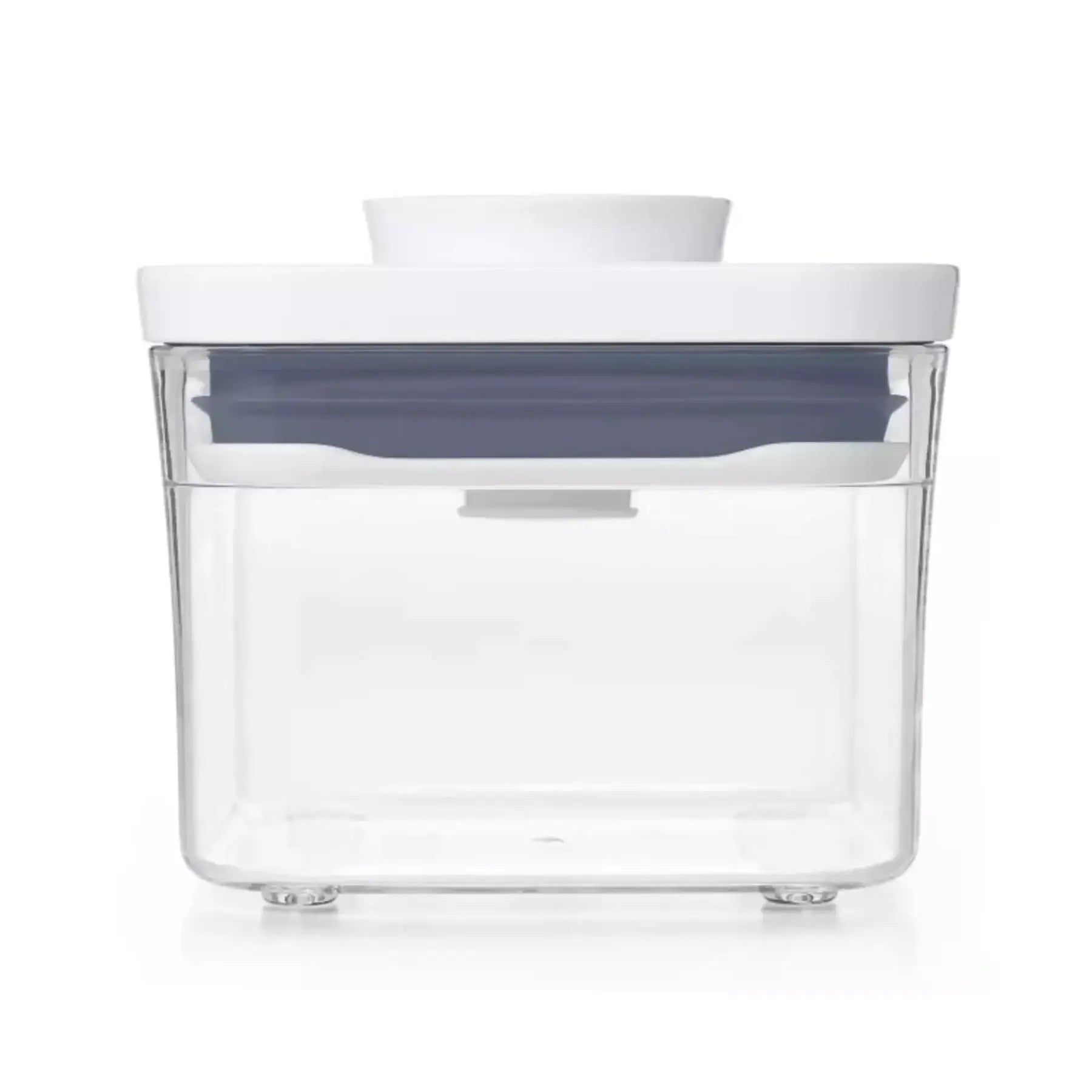 Clear storage container with a white lid on a white background