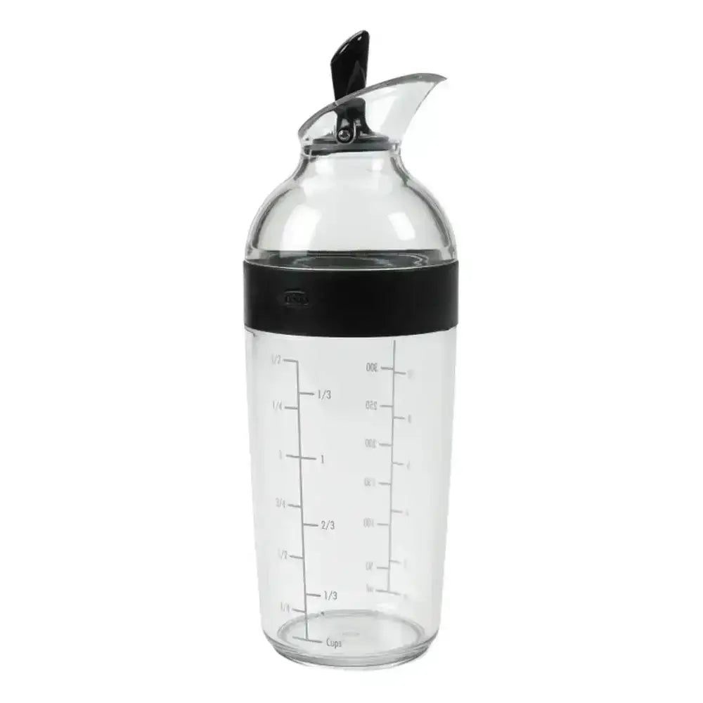 Clear glass bottle with black cap and measurement markings on a white background