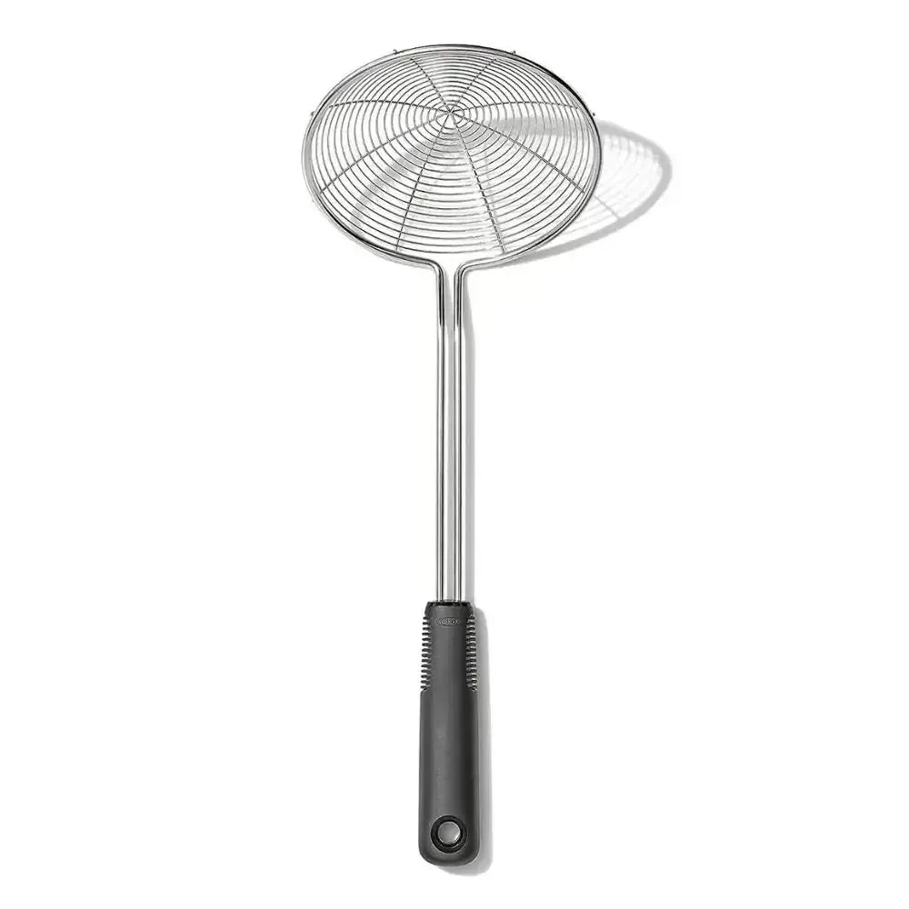 Metal skimmer with black handle on a white background