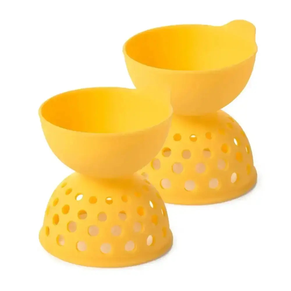 Two yellow silicone egg holders with perforated design on a white background