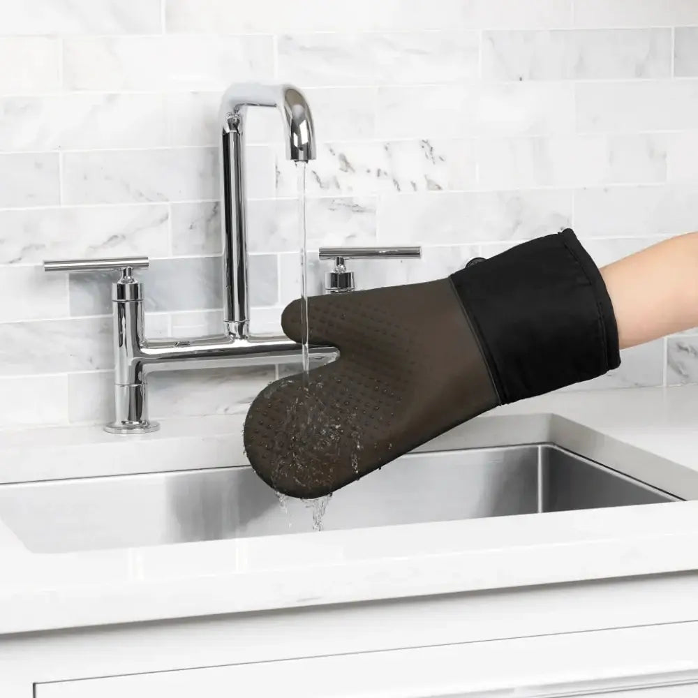 Oxo good grips silicone oven mitt black with textured grip surface and reinforced wrist strap for heat protection