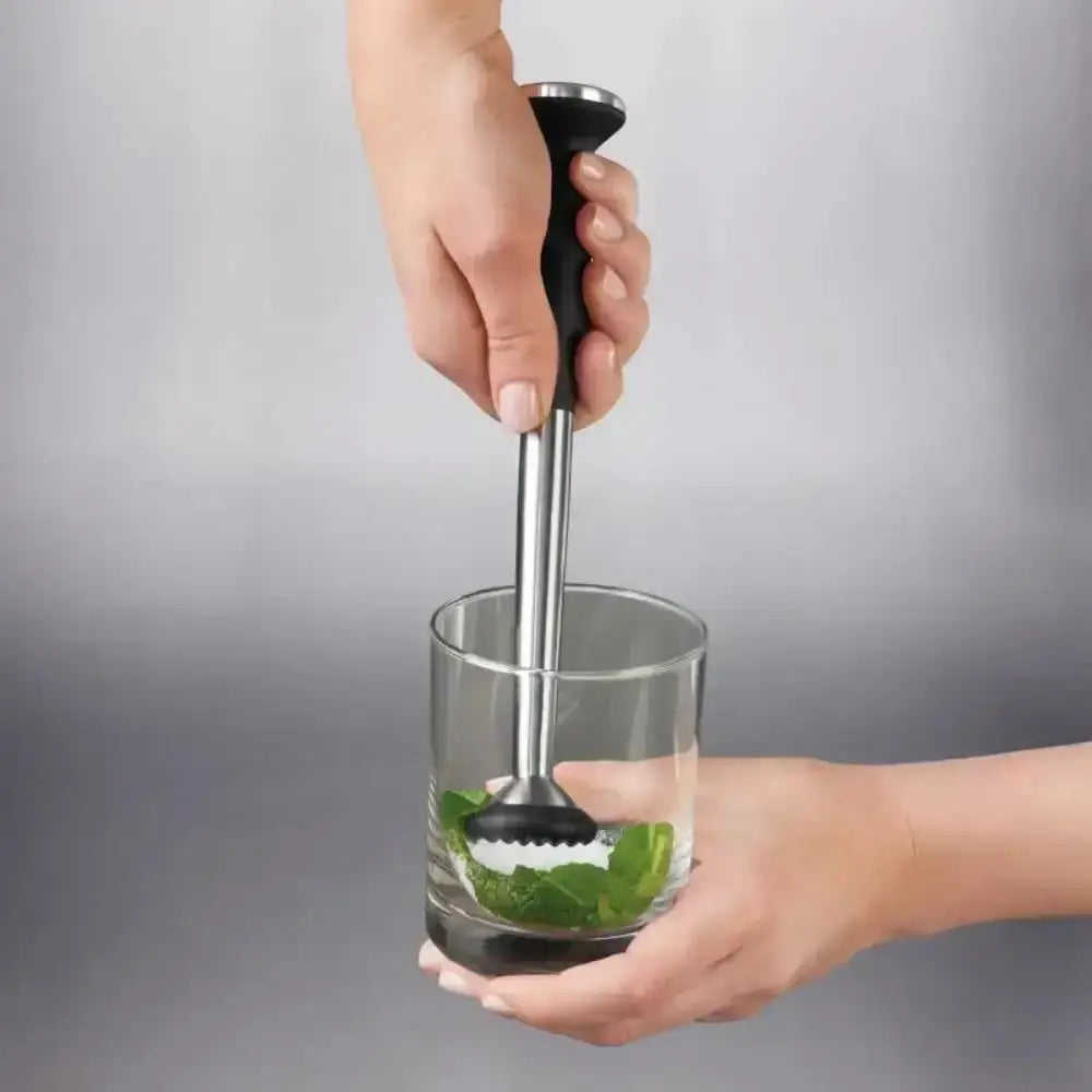 Oxo Good Grips stainless steel cocktail muddler in black with textured grip for easy cocktail crushing and mixing