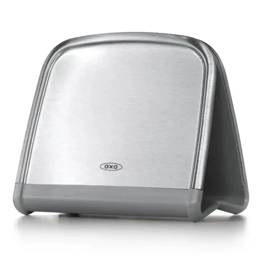 Silver OXO napkin holder on a white background