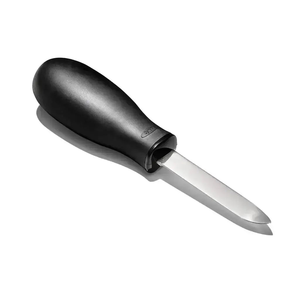 Black handled knife with a metallic blade on a white background
