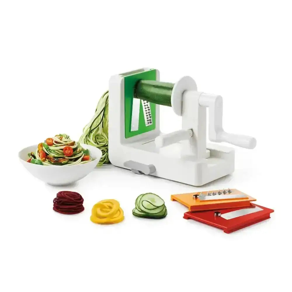 Vegetable spiralizer with sliced vegetables on a white background