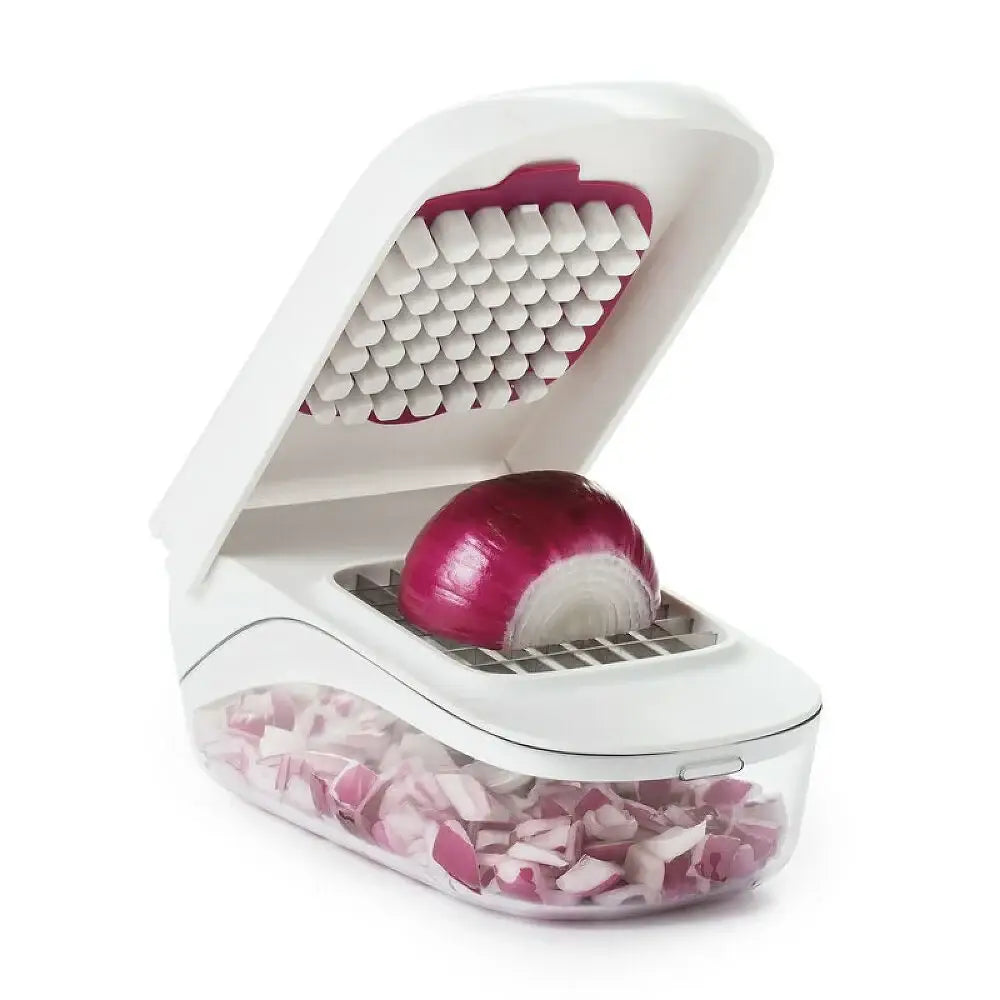 Onion chopper with a red onion being chopped and the diced onions in a clear container on a white background