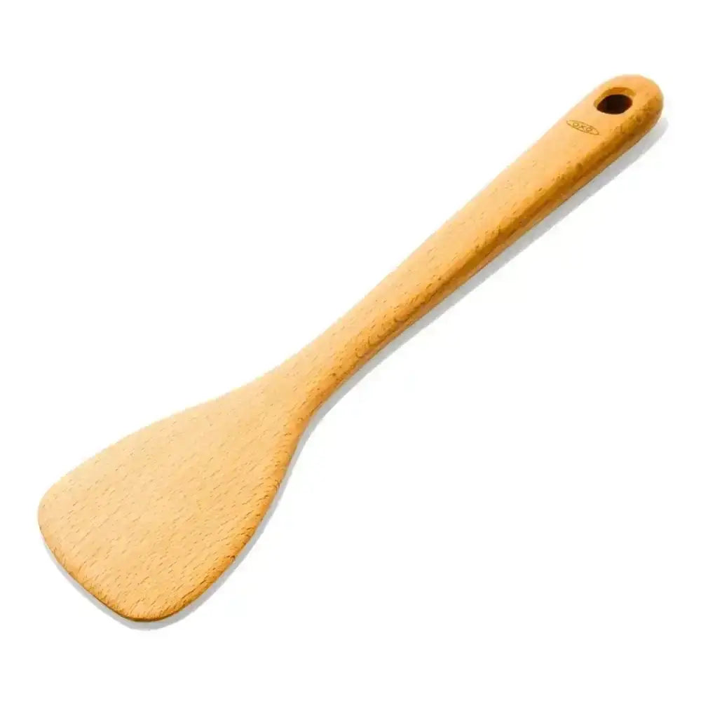 Wooden spatula on a white background