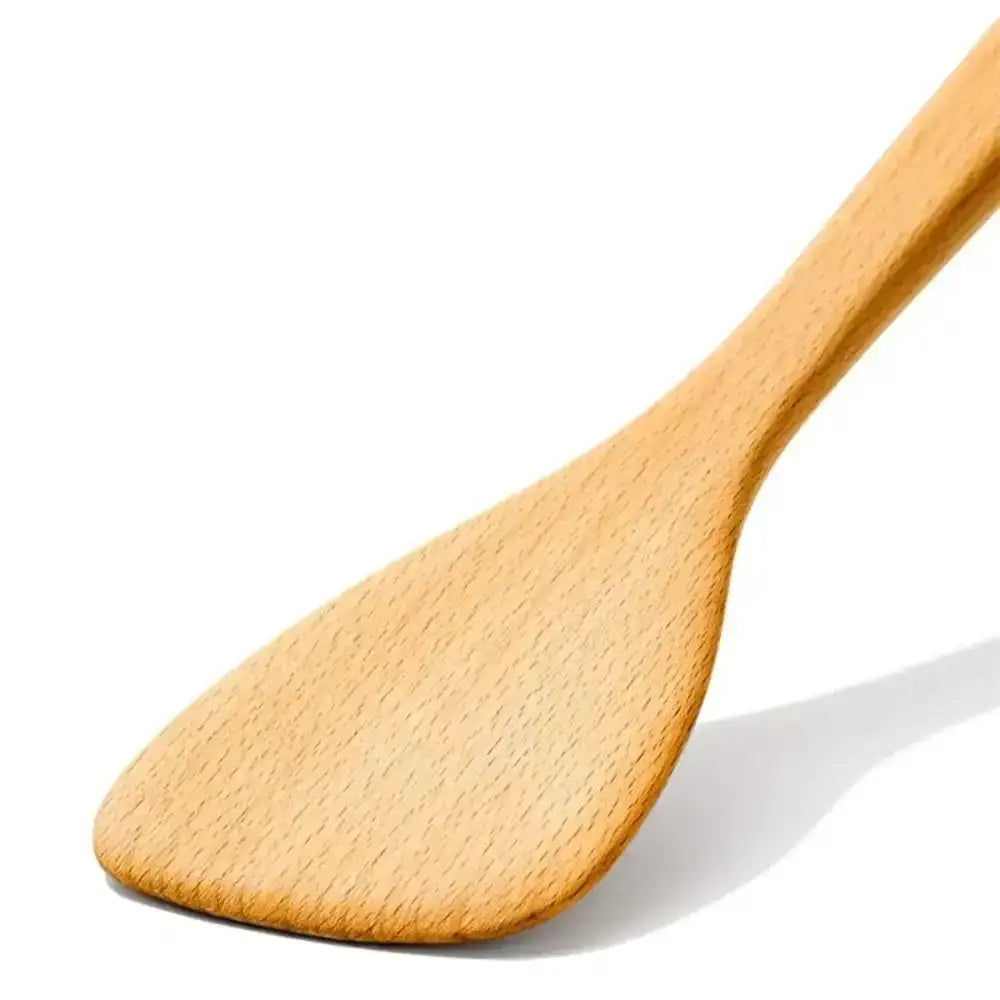 Wooden spoon on a white background