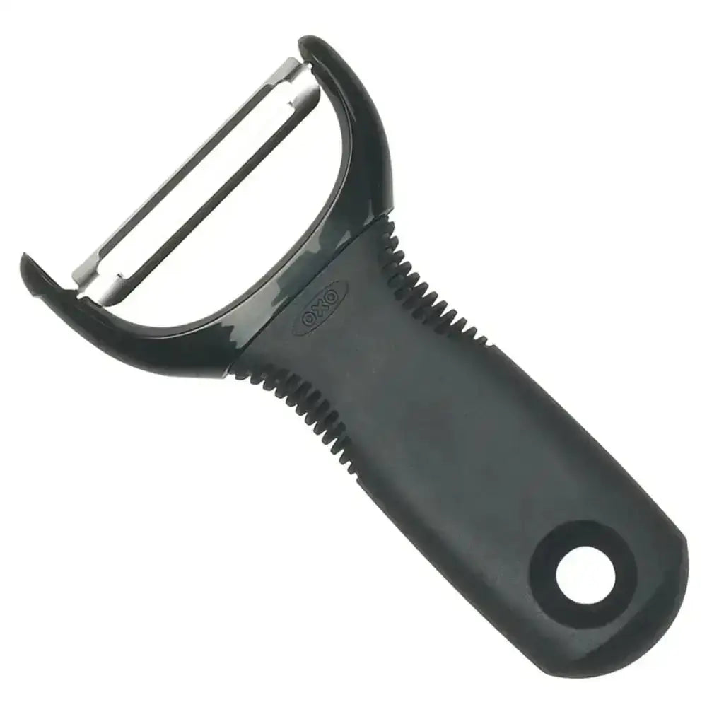 Black vegetable peeler on a white background