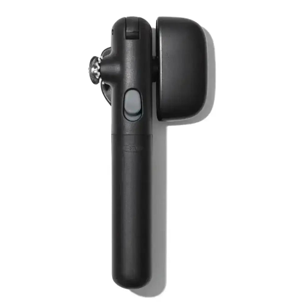Black can opener on a white background