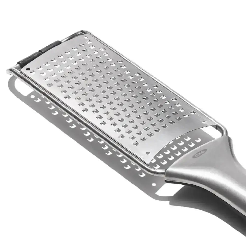 Silver stainless steel oxo multipurpose etched grater with ergonomic handle and multiple textured grating surfaces